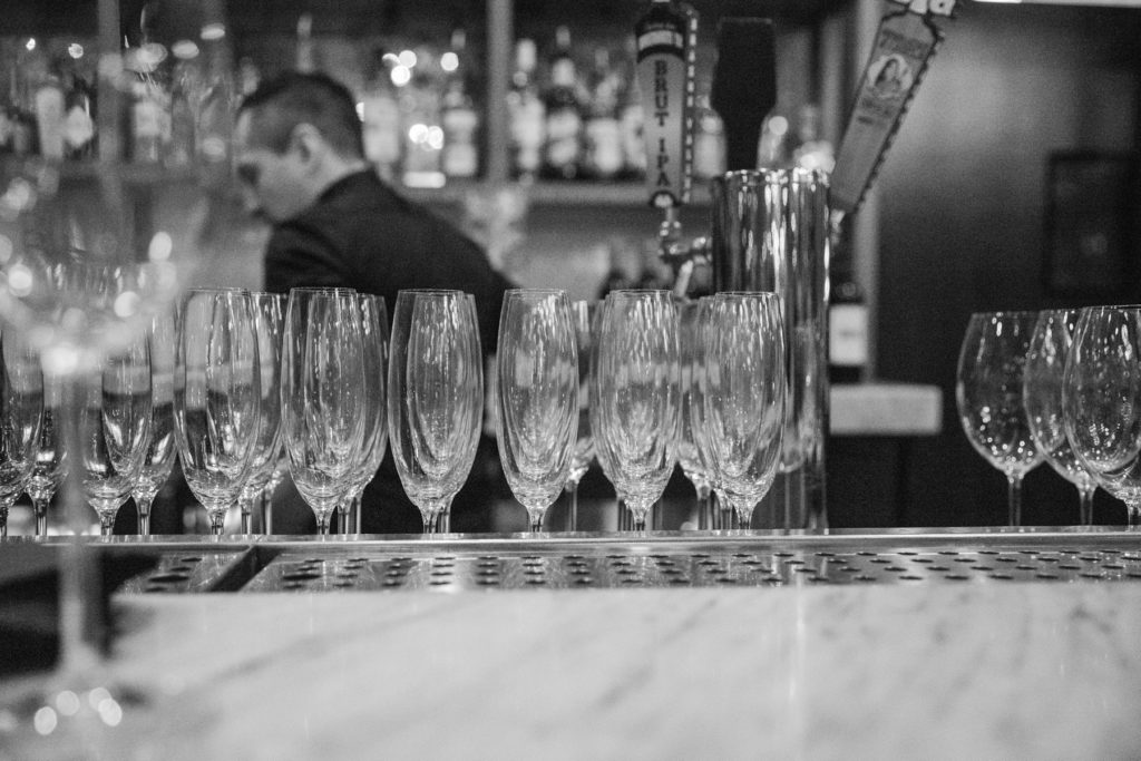 Champagne glasses on a cocktail bar